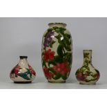 Three Cobridge stoneware floral vases. Height of tallest 22cm