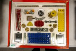 Boxed Meccano steel construction set containing 230 parts and able to make 27 different models.