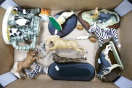 A mixed collection of items to include two cream ware horses, resin animal figures , border fine art