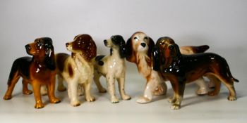 Five Cooper Craft & Similar pottery dog figures, tallest 19cm(5)