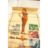 A collection of vintage cinema advertising posters in poor condition including Jazz boat, City of