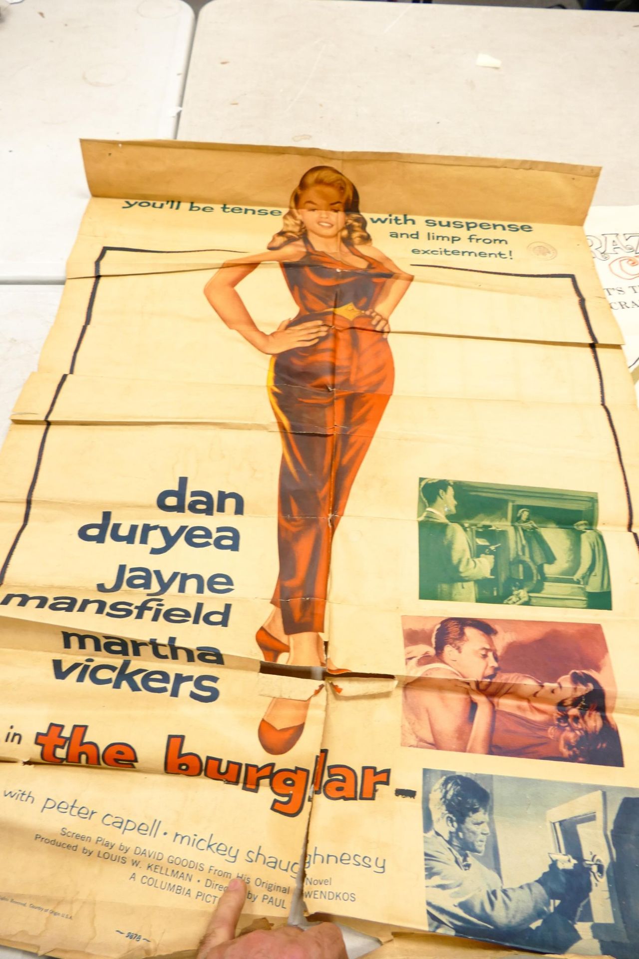 A collection of vintage cinema advertising posters in poor condition including Jazz boat, City of