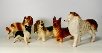 Five Cooper Craft & Similar pottery dog figures, tallest 18cm(5)