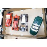 A collection of larger scale Burago plastic classic cars