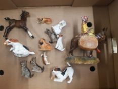 A collection of Beswick and Royal Doulton figures to include Royal Doulton character Dogs and K