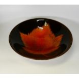 Poole pottery bowl with a leaf design.Diameter 26.5cm