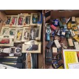A collection of boxed and playworn toy cars to include Corgi and Lledo examples etc (2 trays)