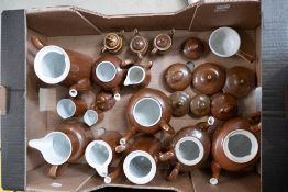 Royal Worcester fireproof ware in brown to include tea and coffee pots, jugs and 2 items of Apilco
