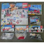 A collection of boxed Lego including Hospital 231, Abulance 6680, Police Wagon 6681 Fire Engine 6593