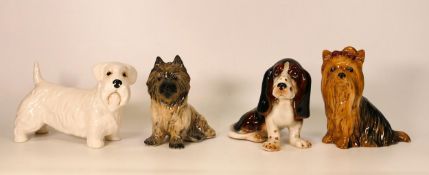 Four Sylvac & Similar Comical Dog Figures, tallest 13cm(4)