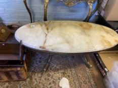 Vintage Oval Onyx topped and brassed metal based coffee table