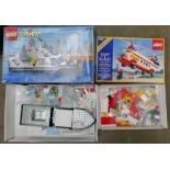 A collection of boxed Sytem Lego including Helicopter 6482 & Police Boat 4021 ( vendor states
