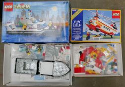 A collection of boxed Sytem Lego including Helicopter 6482 & Police Boat 4021 ( vendor states