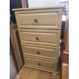 Modern Four Drawer Cabinet, drawers on sliding rails with polished brass handles.