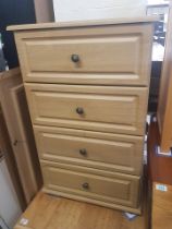 Modern Four Drawer Cabinet, drawers on sliding rails with polished brass handles.