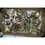 A large heavy collection of brass ware to include candlesticks, ornamental teapots, ornaments,