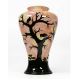 Cobridge stoneware African sunset vase. Height 26cm