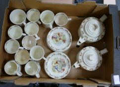 Collection of Royal Doulton Bunnykins teaware to include two tea pots (one a/f), saucers and tea