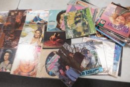 A collection of 1970's & later Easy Listening Theme Lp Records & 12" singles