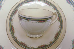 A collection of Royal Doulton Albany tea and dinner ware to include 10 trios, platters, plates,