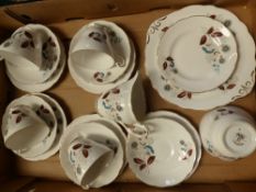 Regency floral patterned part tea set, together with a Ridgway's boxed floral tea set.