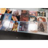 A collection of 1970's & later Lp Records & 12" singles including Pop, Soul & Disco Themes