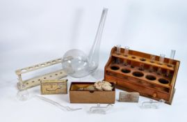 Wooden Apothecary test tube/instrument holder with a collection of antique glass Douches & Vessels
