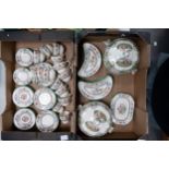 A large collection of Spode Chinese Rose patterned items to include tureens, tea cups & saucers,