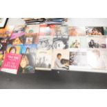 A collection of Signed Lp & 12" Vinyl Records including Emile Ford, Roger Whittaker, Val Doonican,