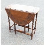 Small Barley Twist Legged Drop Leaf Table with carved top, length 76cm