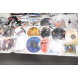 A collection of 1980's & later picture disc records including Rolling Stones, The Killers , Sigsig