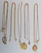 Three 9ct gold neck chains with pendants and one single 9ct chain, gross weight 10.91g.