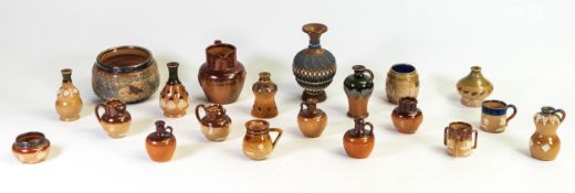 A collection of Royal Doulton Lambeth miniature items including Art Noveau style vases, Doulton salt