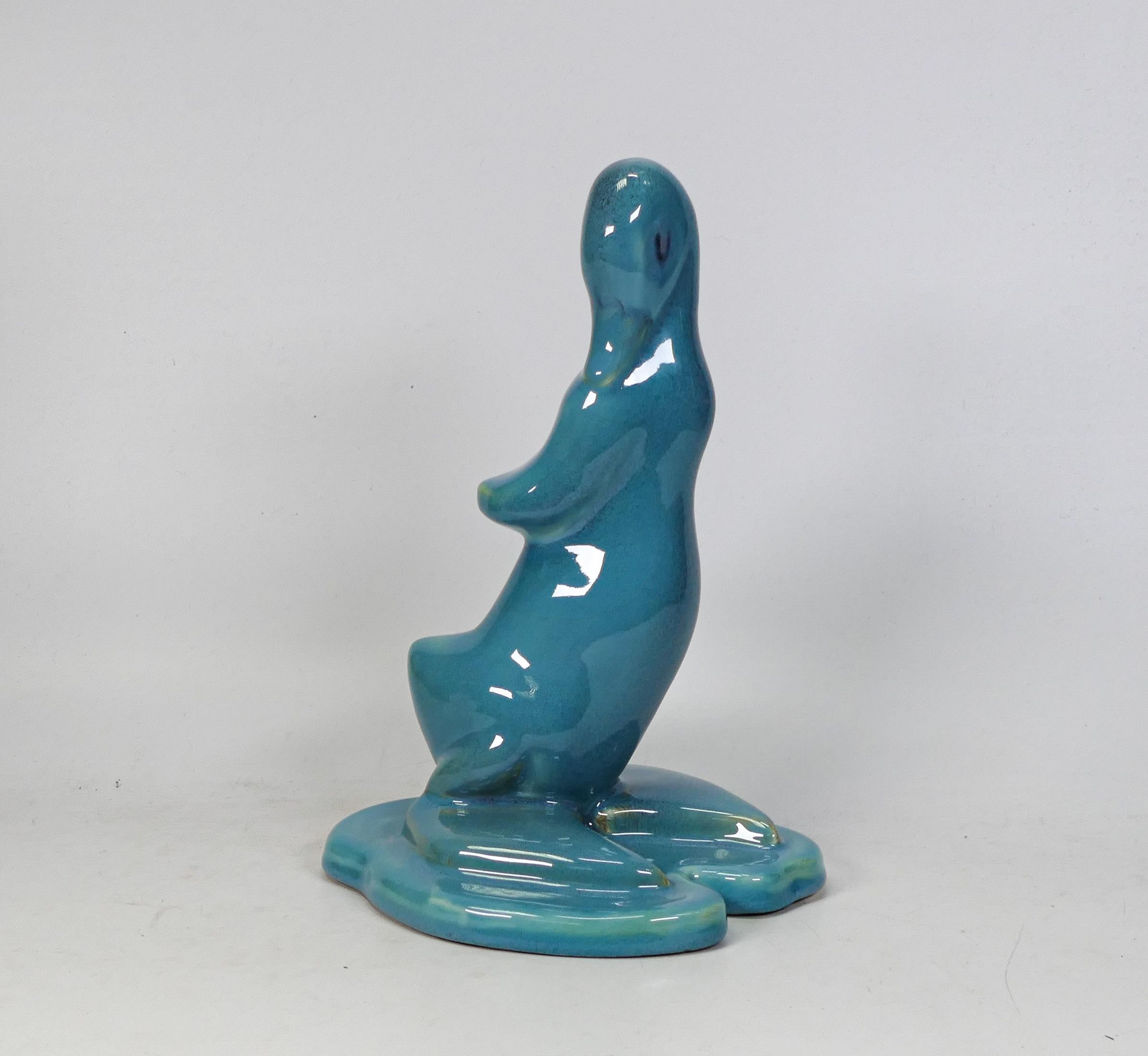 Beswick blue glazed model of a stylised duck on base 317, crazing, height 22cm