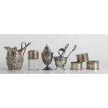 A collection of Silver items comprising serviette rings,Jug, tongues, solid silver 255g, and two