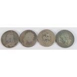 Four UK silver crown coins - 2 x George III, 1 x Victoria (all sterling .925 silver), and George V