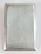 Silver cigarette case London 1931, weight 166.4g. Some denting and scratches.