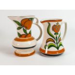 Pair of Wade stylised tree pattern water jugs, height of tallest 20cm. These were removed from the