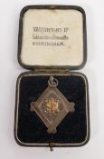 Hallmarked silver pendant Salford Harriers Club 1936, boxed, 13.5g.