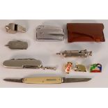 A collection of items including penknives, football whistles, lighter, badges etc (9)