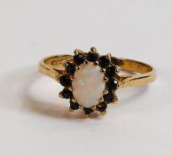 9ct gold ladies dress ring, set with opal and sapphires, size N, 1.9g.