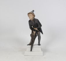 Royal Copenhagen The Sandman porcelain figurine of a boy with his umbrella 1129, height 17cm