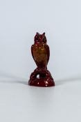 Bernard Moore mottled Flambe model of an owl perched on branch, h.9cm.