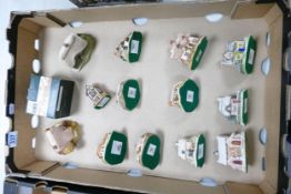 A collection of Boxed Lilliput Lane Houses to include ash nook , little shambles, river view,