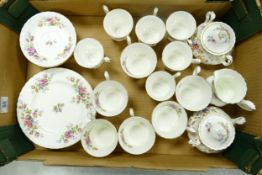 A collection of Royal Albert Moss rose patterned items to include cups & saucers, coffee cups, sugar