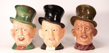Three Beswick Large Character jugs of Micawber Title Deeds ( in three colour ways )