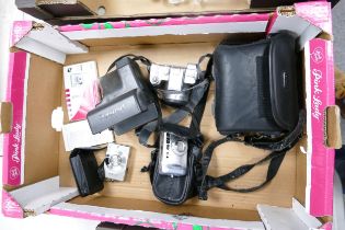 A collection of vintage cameras to include Canon Ixus II, Polaroid 636, Canon Prima Super 130 &