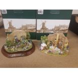 Two boxed Lilliput cottages to include The Enchanted Garden L2410 and The Golden Jubillee L2488. (2)
