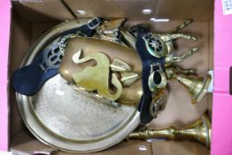 A collection of brass ware including platter, horse brasses, candlesticks, ornaments etc