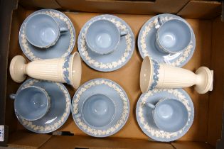 A collection of Wedgwood Queensware item to include cups & non matching saucers & two vases